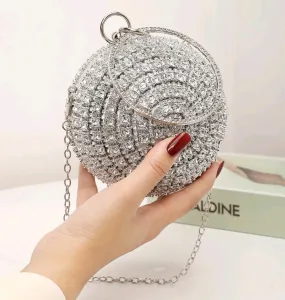 Silver rhinestone decor top ring circle bag.